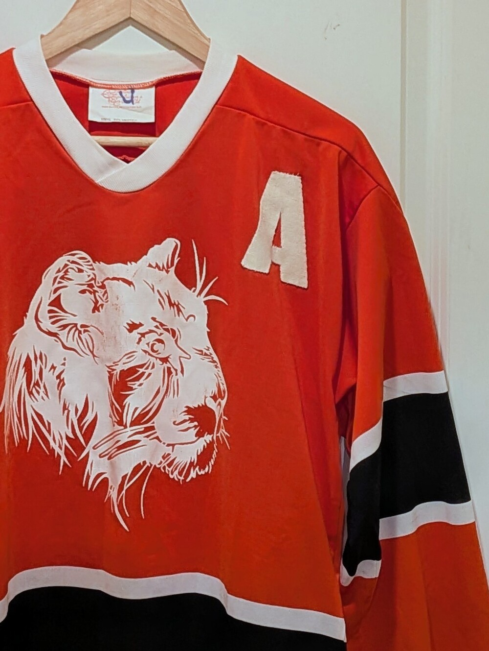 GUC 1980s S Orange And Black Assistant Captain Hockey Jersey with Cat Logo - Picture 2 of 6